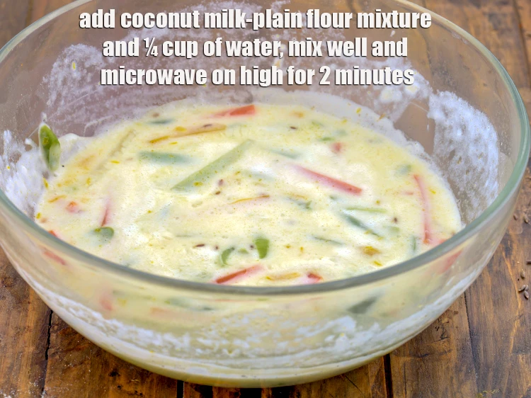 Step 7 – <p><span style="background-color:rgb(255,255,255);color:rgb(0,0,0);">Add the <strong>coconut milk-plain flour mixture</strong> and ¼ cup of <strong>water</strong>, mix well and …