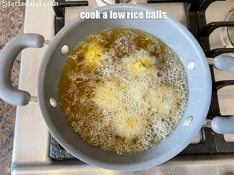 Step 16 – <html><head><meta charset="UTF-8"></head><body><p>Slide a few balls in the hot oil carefully. Depending upon the size of …