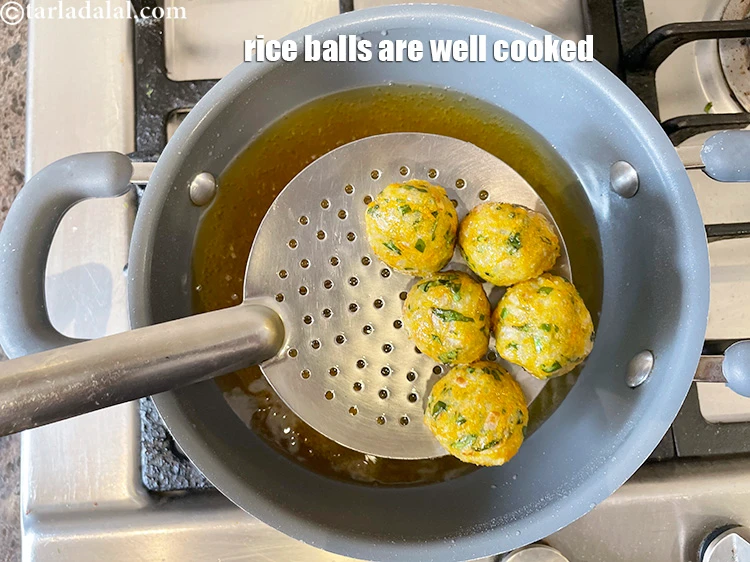 Step 18 – <p>See the rice balls are well cooked.</p>