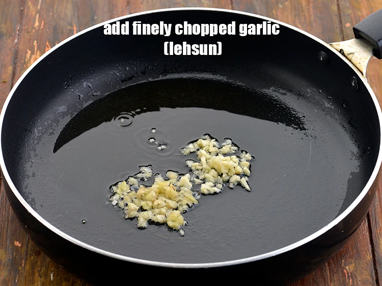 Step 26 – <p>Now, add the <span style="background-color:rgb(255,255,255);color:rgb(0,0,0);">1 tsp finely </span><a href="https://www.tarladalal.com/glossary-garlic-lehsun-lahsun-348i#ing_2370"><u>chopped garlic (lehsun)</u></a> as well. Both ginger …