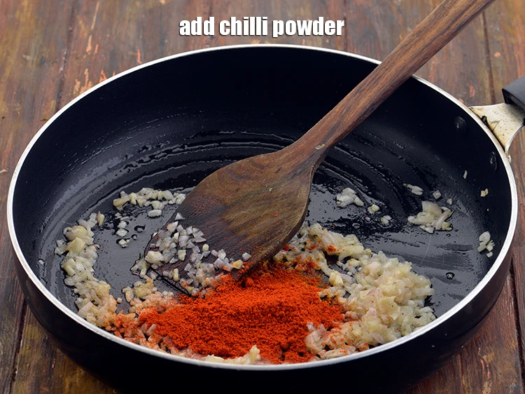 Step 31 – <p>Add the <span style="background-color:rgb(255,255,255);color:rgb(0,0,0);">2 tsp </span><a href="https://www.tarladalal.com/glossary-chilli-powder-red-chilli-powder-339i"><u>chilli powder</u></a> for a little kick.</p>