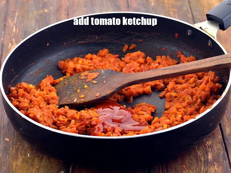 Step 36 – <p>Add the <span style="background-color:rgb(255,255,255);color:rgb(0,0,0);">1 tbsp </span><a href="https://www.tarladalal.com/glossary-tomato-ketchup-tomato-sauce-181i"><u>tomato ketchup</u></a> for a sweet and slightly tangy taste …