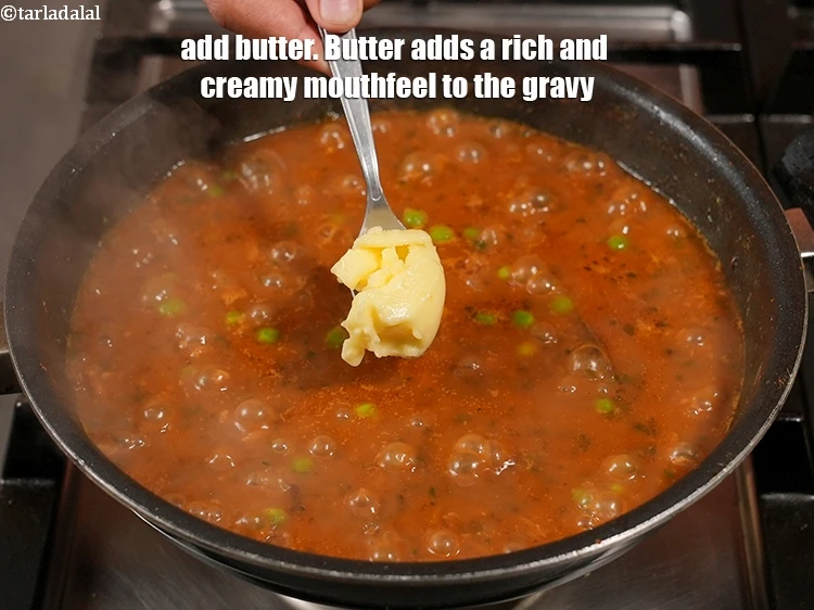 Step 39 – <p>Add 2 tbsp <a href="https://www.tarladalal.com/glossary-butter-makhan-233i">butter</a>. Butter adds a rich and creamy mouthfeel to the gravy.</p>
