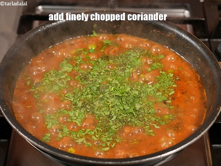 Step 41 – <p>Add 2 tbsp finely&nbsp;<a href="https://www.tarladalal.com/glossary-chopped-coriander-783i">chopped coriander (dhania)</a>.&nbsp;</p>