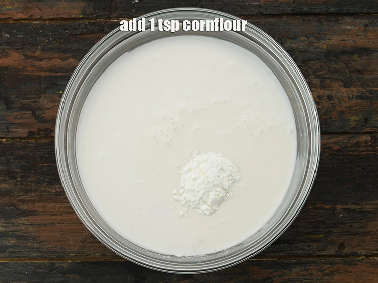 Step 23 – <p>Add <span style="background-color:rgb(255,255,255);color:rgb(0,0,0);">1 tsp </span><a href="https://www.tarladalal.com/glossary-cornflour-cornstarch-maize-starch-corn-flour-112i"><u>cornflour</u></a><u>.</u></p>