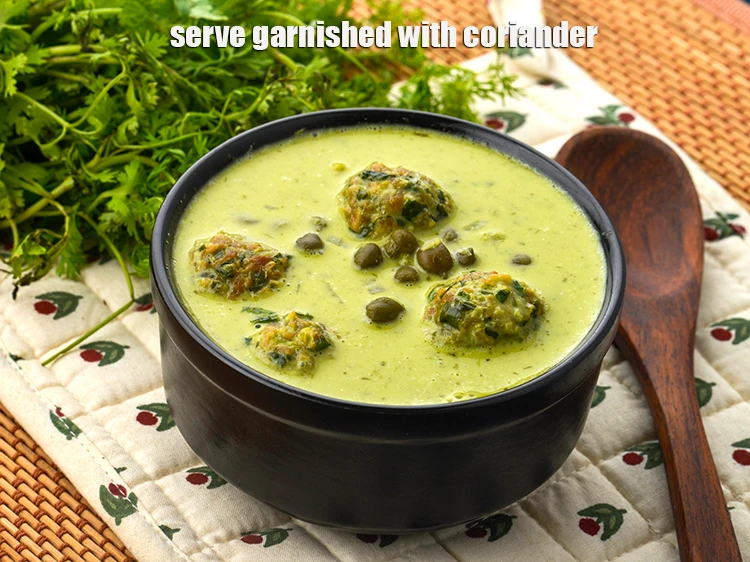 Step 30 – <p><span style="background-color:rgb(255,255,255);color:rgb(0,0,0);">Serve garnished with </span><a href="https://www.tarladalal.com/glossary-coriander-dhania-kothmir-369i#ing_2365"><u>chopped coriander (dhania)</u></a><span style="background-color:rgb(255,255,255);color:rgb(0,0,0);"> hot.</span></p>