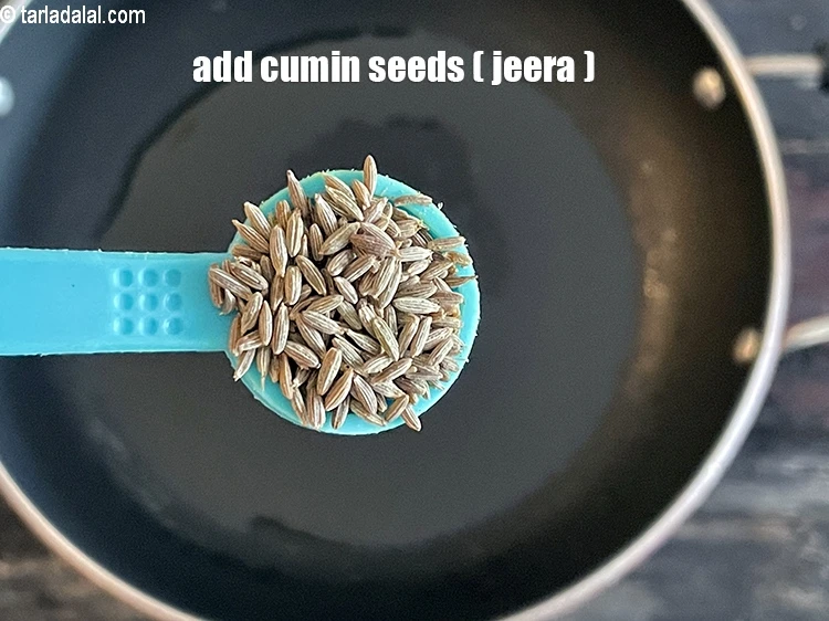 Step 20 – <html><head></head><body><p>Add&nbsp;1/2 tsp&nbsp;<a href="glossary-cumin-seeds-jeera-zeera-381i">cumin seeds (jeera)</a>.</p></body></html>