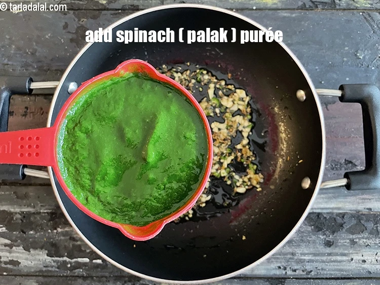 Step 26 – <html><head></head><body><p>Add&nbsp;3/4 cup&nbsp;<a href="glossary-spinach-puree-palak-ki-puree-256i">spinach (palak) purée</a>.</p></body></html>