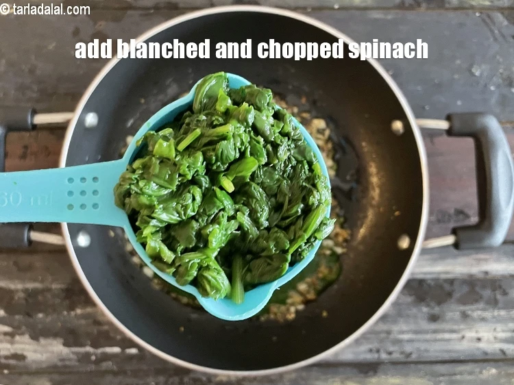 Step 27 – <html><head></head><body><p>Add&nbsp;1/2 cup&nbsp;<a href="glossary-blanched-and-chopped-spinach-1915i">blanched and chopped spinach</a>.</p></body></html>