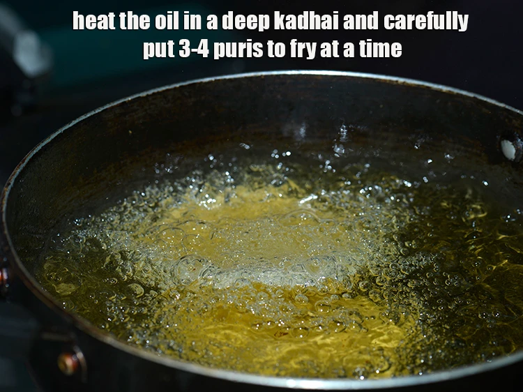 Step 16 – <p>To deep-fry <strong>masala puri</strong>, heat the <a href="https://www.tarladalal.com/glossary-oil-671i"><u>oil</u></a> in a deep kadhai and carefully put …