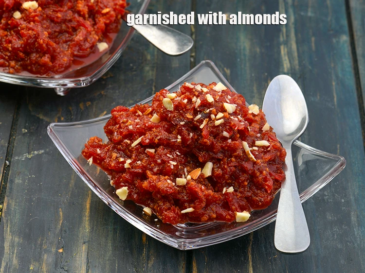 Step 4 – <p><span style="background-color:rgb(255,255,255);color:rgb(0,0,0);">Garnished with 1 tsp finely </span><a href="https://www.tarladalal.com/glossary-almonds-badam-378i#ing_3231"><u>chopped almonds (badam)</u></a><span style="background-color:rgb(255,255,255);color:rgb(0,0,0);">.</span></p>