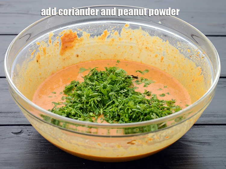 Step 2 – <p><span style="background-color:rgb(255,255,255);color:rgb(0,0,0);">Add the 1 cup finely </span><a href="https://www.tarladalal.com/glossary-coriander-dhania-kothmir-369i#ing_2365"><u>chopped coriander (dhania)</u></a><span style="background-color:rgb(255,255,255);color:rgb(0,0,0);"> and <strong>peanut powder</strong>.</span></p>
