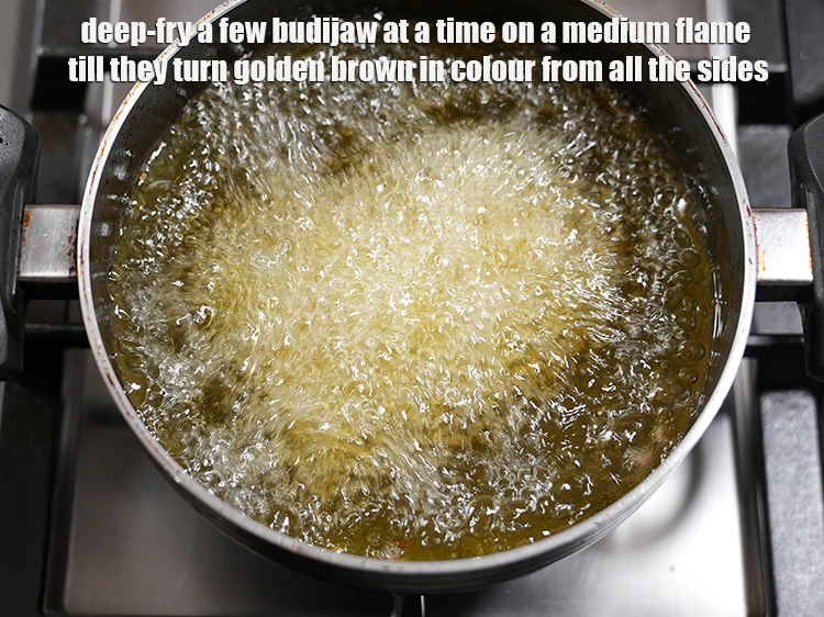 Step 11 – <p><span style="background-color:rgb(255,255,255);color:rgb(0,0,0);">Heat the </span><a href="https://www.tarladalal.com/glossary-oil-671i"><u>oil</u></a><u> </u><span style="background-color:rgb(255,255,255);color:rgb(0,0,0);">in a deep non-stick pan and <strong>deep-fry</strong> a few …