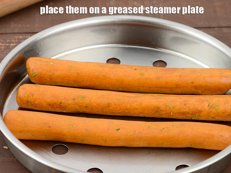 Step 16 – <p><span style="background-color:rgb(255,255,255);color:rgb(0,0,0);">Place them on a greased steamer plate.</span></p>