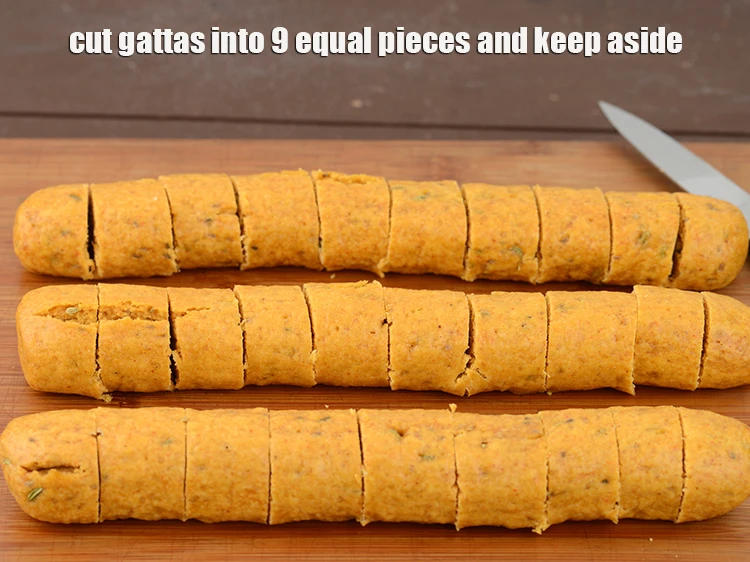 Step 19 – <p><span style="background-color:rgb(255,255,255);color:rgb(0,0,0);">Cut the <strong>gattas</strong> into 9 equal pieces and keep aside.</span></p>