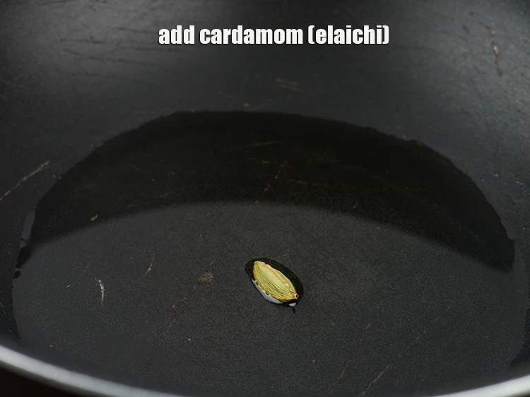 Step 30 – <p>Add <span style="background-color:rgb(255,255,255);color:rgb(0,0,0);">1 </span><a href="https://www.tarladalal.com/glossary-cardamom-elaichi-262i"><u>cardamom (elaichi)</u></a><u>.</u></p>