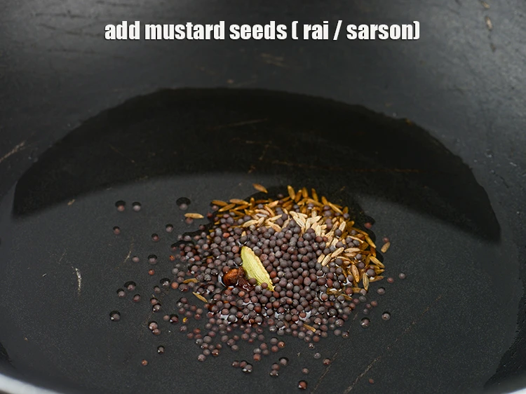 Step 32 – <p>Add <span style="background-color:rgb(255,255,255);color:rgb(0,0,0);">1/2 tsp </span><a href="https://www.tarladalal.com/glossary-mustard-seeds-sarson-rai-sarson-ke-beej-525i"><u>mustard seeds ( rai / sarson)</u></a><u>.</u></p>