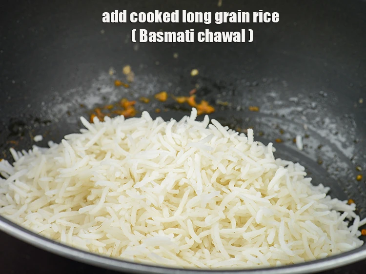 Step 41 – <p><span style="background-color:rgb(255,255,255);color:rgb(0,0,0);">Add the 3 cups </span><a href="https://www.tarladalal.com/glossary-long-grain-rice-basmati-chawal-basmati-rice-535i#ing_2891"><u>soaked and cooked long grain rice (Basmati chawal)</u></a><u>.</u></p>