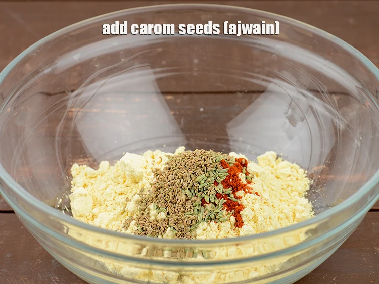 Step 6 – <p>Add <span style="background-color:rgb(255,255,255);color:rgb(0,0,0);">1 tsp </span><a href="https://www.tarladalal.com/glossary-carom-seeds-ajwain-Thymol-seeds-bishops-weed-266i"><u>carom seeds (ajwain)</u></a><u>.</u></p>
