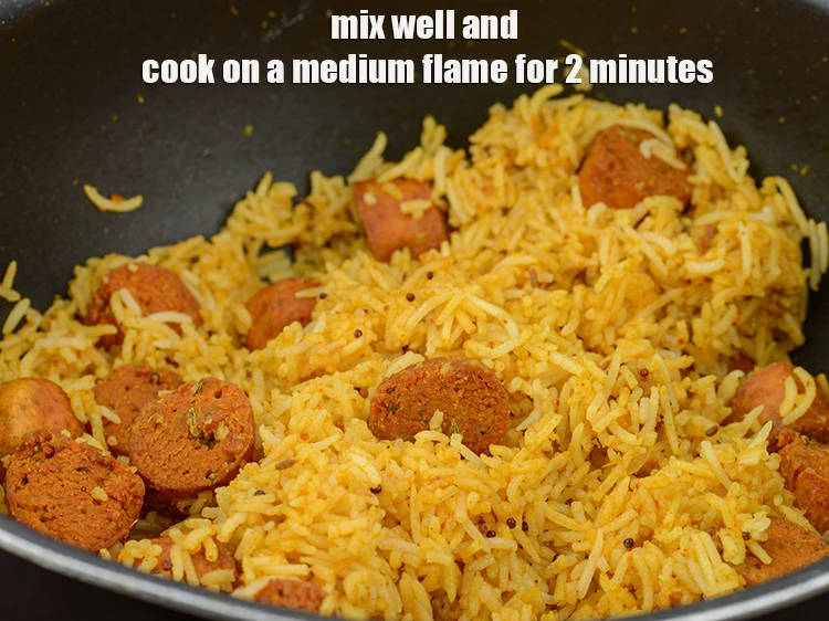 Step 44 – <p><span style="background-color:rgb(255,255,255);color:rgb(0,0,0);">Mix well and <strong>cook</strong> on a medium flame for 2 minutes, while stirring occasionally.</span></p>
