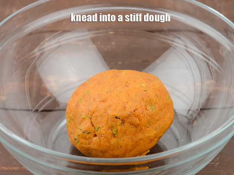 Step 11 – <p><span style="background-color:rgb(255,255,255);color:rgb(0,0,0);">Knead into a stiff dough.</span></p>