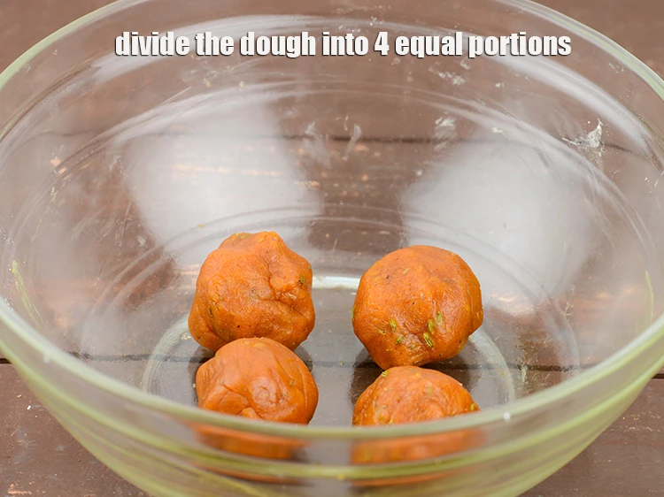 Step 12 – <p><span style="background-color:rgb(255,255,255);color:rgb(0,0,0);">Divide the <strong>dough</strong> into 4 equal portions.</span></p>