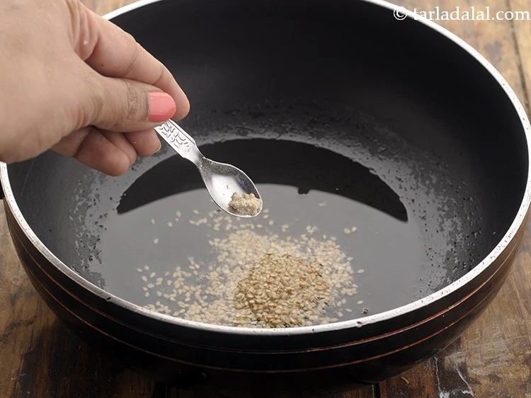 Step 33 – <p>Add asafoetida and sauté on a medium flame for a few seconds.</p>