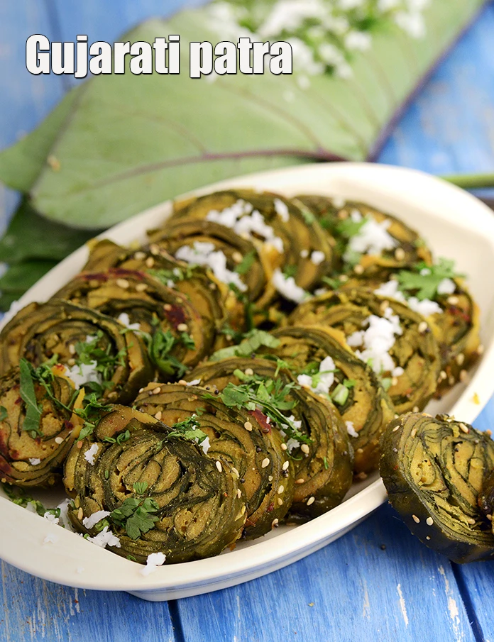 Step 38 – <p>Serve the&nbsp;<strong>Gujarati patra&nbsp;</strong>hot.&nbsp; <a href="https://www.tarladalal.com/corn-kachori-bhutte-ki-kachori-41535r">Corn Kachori</a>,&nbsp;<a href="https://www.tarladalal.com/rava-and-vegetable-dhokla-1857r">Rava and Vegetable Dhokla</a>,&nbsp;<a href="https://www.tarladalal.com/farali-pattice--mumbai-roadside-recipes--33440r">Farali Pattice</a>&nbsp;are some other popular&nbsp;<a …