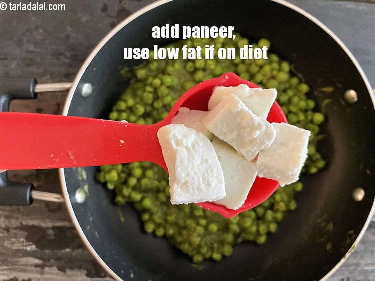 Step 22 – <html><head></head><body><p>Add&nbsp;1/4 cup&nbsp;<a href="glossary-low-fat-paneer-cubes-low-fat-paneer-ke-tukde-1116i">chopped low-fat paneer (cottage cheese) cubes</a>.</p></body></html>