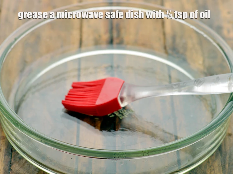 Step 17 – <p><span style="background-color:rgb(255,255,255);color:rgb(0,0,0);">Grease a <strong>microwave</strong> <strong>safe dish</strong> with ¼ tsp of </span><a href="https://www.tarladalal.com/glossary-oil-671i"><u>oil </u></a><span style="background-color:rgb(255,255,255);color:rgb(0,0,0);">.</span></p>