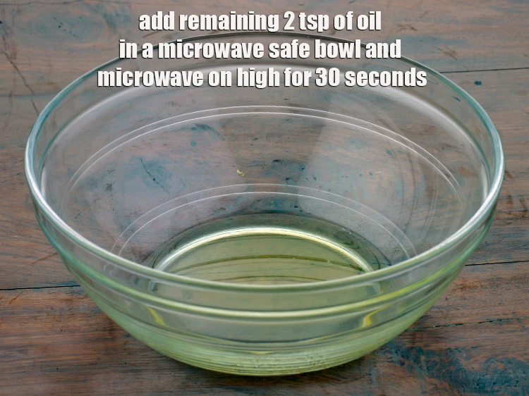 Step 21 – <p><span style="background-color:rgb(255,255,255);color:rgb(0,0,0);"><strong>For the tempering</strong>, add the remaining 2 tsp of </span><a href="https://www.tarladalal.com/glossary-oil-671i"><u>oil&nbsp;</u></a><span style="background-color:rgb(255,255,255);color:rgb(0,0,0);"> in a …