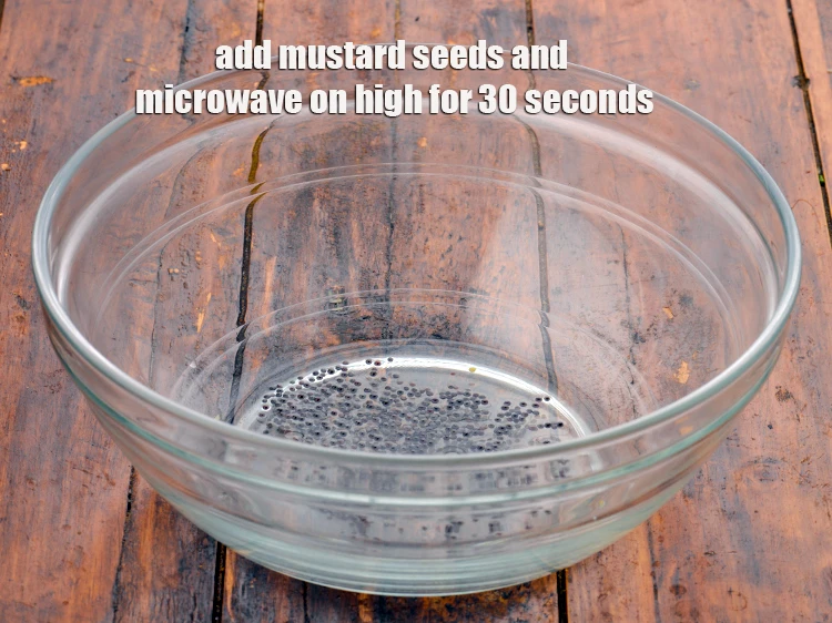 Step 22 – <p><span style="background-color:rgb(255,255,255);color:rgb(0,0,0);">Add the 1/2 tsp </span><a href="https://www.tarladalal.com/glossary-mustard-seeds-sarson-rai-sarson-ke-beej-525i"><u>mustard seeds ( rai / sarson)</u></a><span style="background-color:rgb(255,255,255);color:rgb(0,0,0);"> and <strong>microwave</strong> …