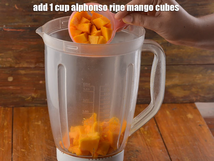 Step 2 – <p>Add <span style="background-color:rgb(255,255,255);color:rgb(0,0,0);">1 cup alphonso ripe </span><a href="https://www.tarladalal.com/glossary-mango-aam-kairi-138i#ing_2998"><u>mango cubes</u></a><u>.</u></p>