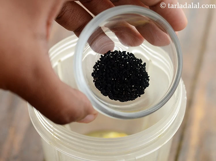 Step 6 – <p>Add nigella seeds.</p>