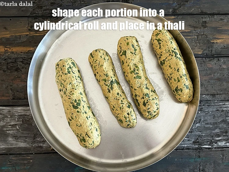 Step 19 – <p>Shape each portion into a cylindrical roll and place in a thali.</p>