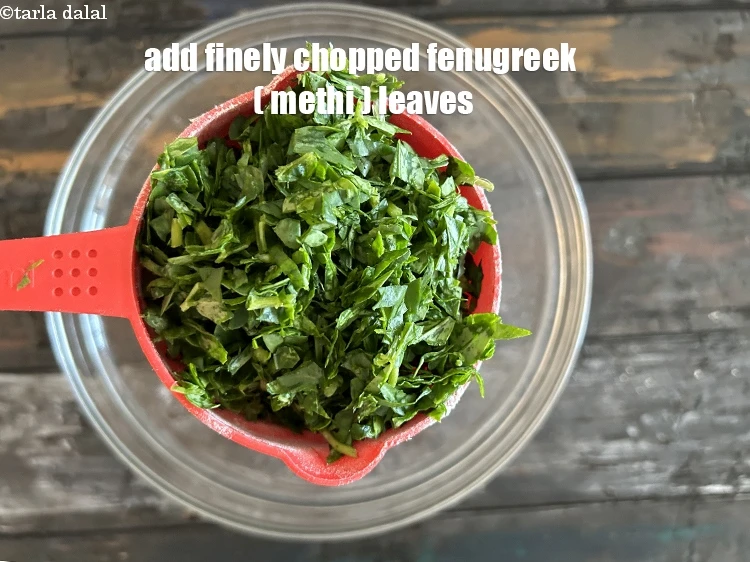 Step 4 – <html><head></head><body><p>Add&nbsp;1 1/2 cups&nbsp;finely&nbsp;<a href="glossary-chopped-fenugreek-811i">chopped fenugreek (methi)</a>&nbsp;leaves.</p></body></html>