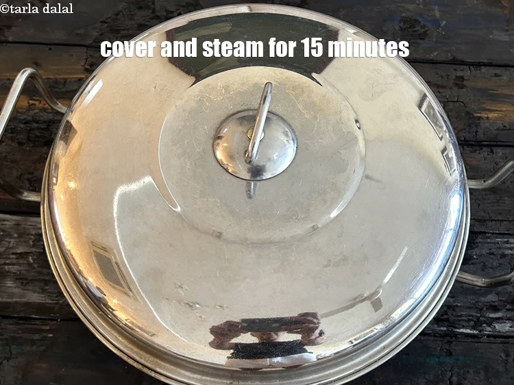 Step 43 – <p><span style="background-color:rgb(255,255,255);color:rgb(0,0,0);">Cover and steam in a steamer for 15 minutes.</span></p>