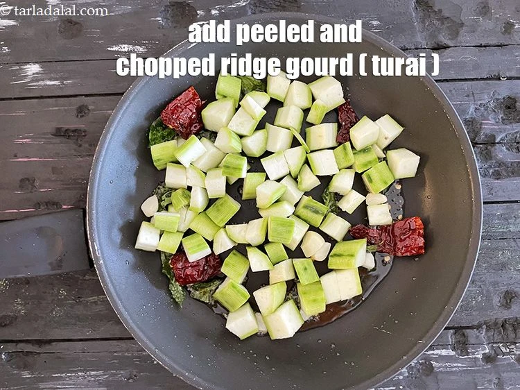 Step 12 – <html><head></head><body><p>Add&nbsp;1 1/4 cups&nbsp;peeled and&nbsp;<a href="glossary-chopped-ridge-gourd-354i">chopped ridge gourd (turai)</a>.</p></body></html>