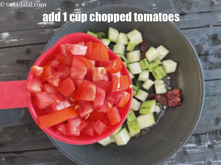 Step 13 – <html><head></head><body><p>Add&nbsp;1 cup&nbsp;<a href="glossary-chopped-tomatoes-779i">chopped tomatoes</a>.</p></body></html>
