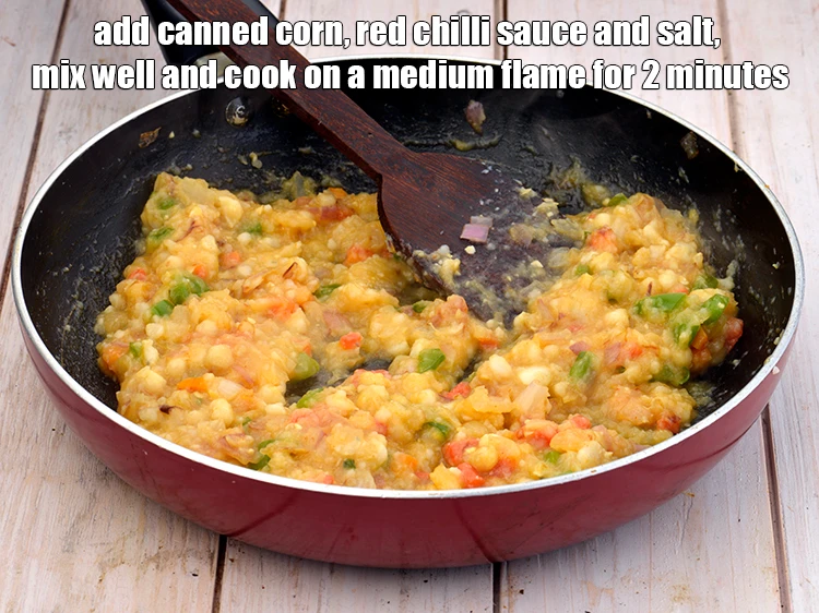 Step 5 – <p><span style="background-color:rgb(255,255,255);color:rgb(0,0,0);">Add the canned 1 cup </span><a href="https://www.tarladalal.com/glossary-cream-style-corn-161i"><u>cream style corn</u></a><span style="background-color:rgb(255,255,255);color:rgb(0,0,0);">, 1 1/2 tsp red …