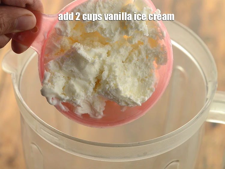 Step 7 – <p>Add <span style="background-color:rgb(255,255,255);color:rgb(0,0,0);">2 cups </span><a href="https://www.tarladalal.com/glossary-Vanilla-ice-cream-1887i"><u>vanilla ice cream.</u></a></p>