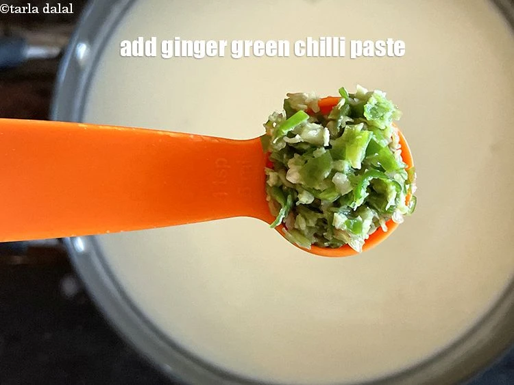 Step 18 – <p>Add 1 tsp <a href="https://www.tarladalal.com/glossary-green-chilli-paste-hari-mirch-ki-paste-mirchi-paste-333i"><u>green chilli paste</u></a><u>.</u></p>