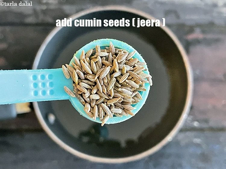 Step 25 – <p style="margin-left:0px;">Add 1/2 tsp <a href="https://www.tarladalal.com/glossary-cumin-seeds-jeera-zeera-381i"><u>cumin seeds (jeera)</u></a></p>