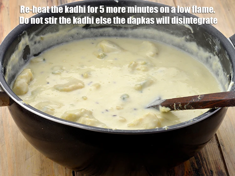 Step 34 – <p><span style="background-color:rgb(255,255,255);color:rgb(0,0,0);">Re-heat the kadhi for 5 more minutes on a low flame. Do not stir …