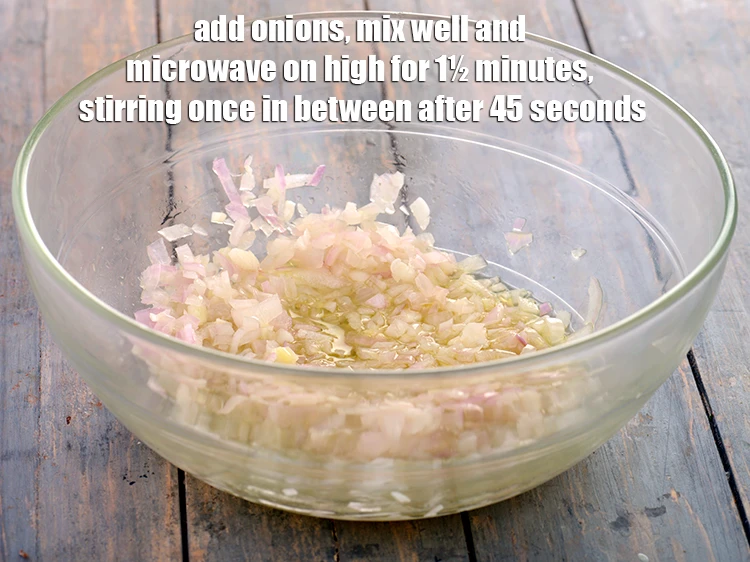 Step 9 – <p>Add the 1 cup <a href="https://www.tarladalal.com/glossary-onions-pyaz-pyaaz-kanda-548i#ing_2327"><u>chopped onion</u></a>, mix well and <strong>microwave</strong> on high for 1½ …