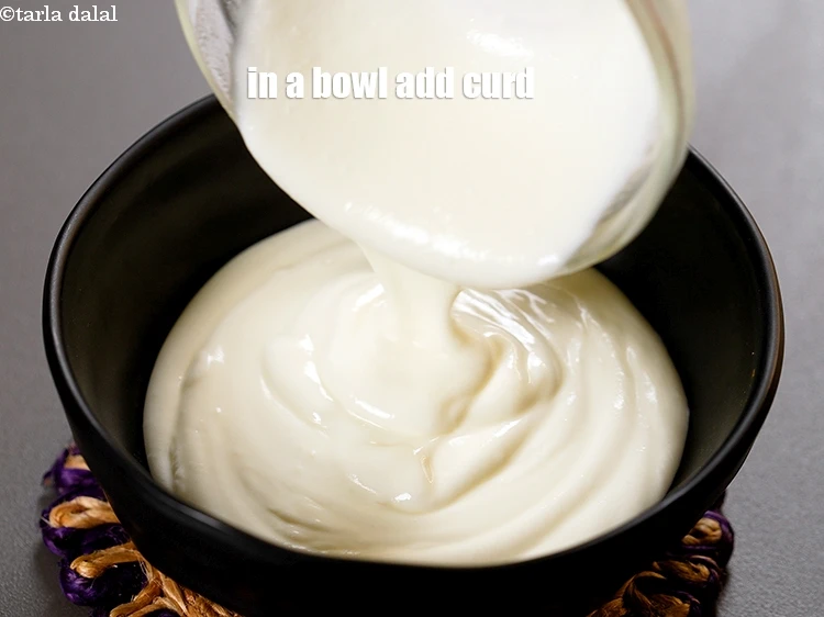 Step 3 – <p>To make <strong>palak kadhi</strong>, in a bowl add 1 cup curd.</p>