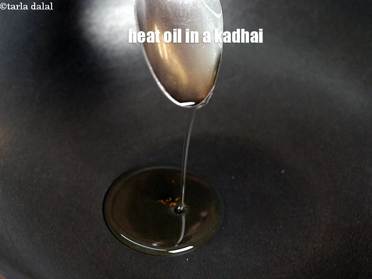 Step 6 – <p>Heat 2 tsp oil in a deep non-stick kadhai.</p>