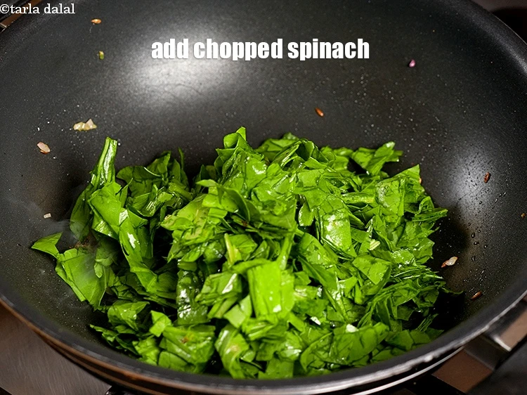 Step 10 – <p>Add 1 cup roughly chopped spinach.</p>
