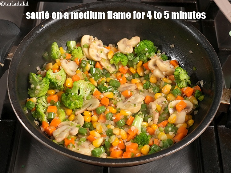 Step 14 – <p>Sauté on a medium flame for 4 to 5 minutes, while stirring occasionally.</p>