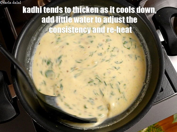 Step 21 – <p>Kadhi tends to thicken as it cools down, add little water to adjust the consistency …